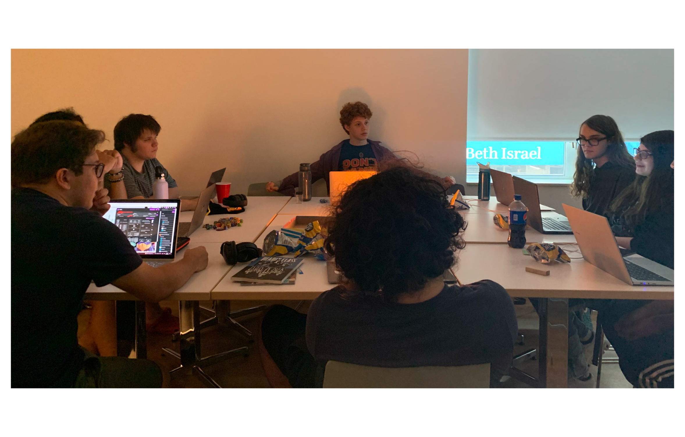 Teens writing on laptops
