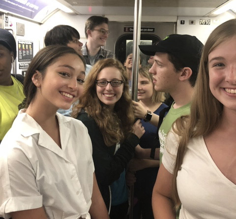 teens in an NYC subway