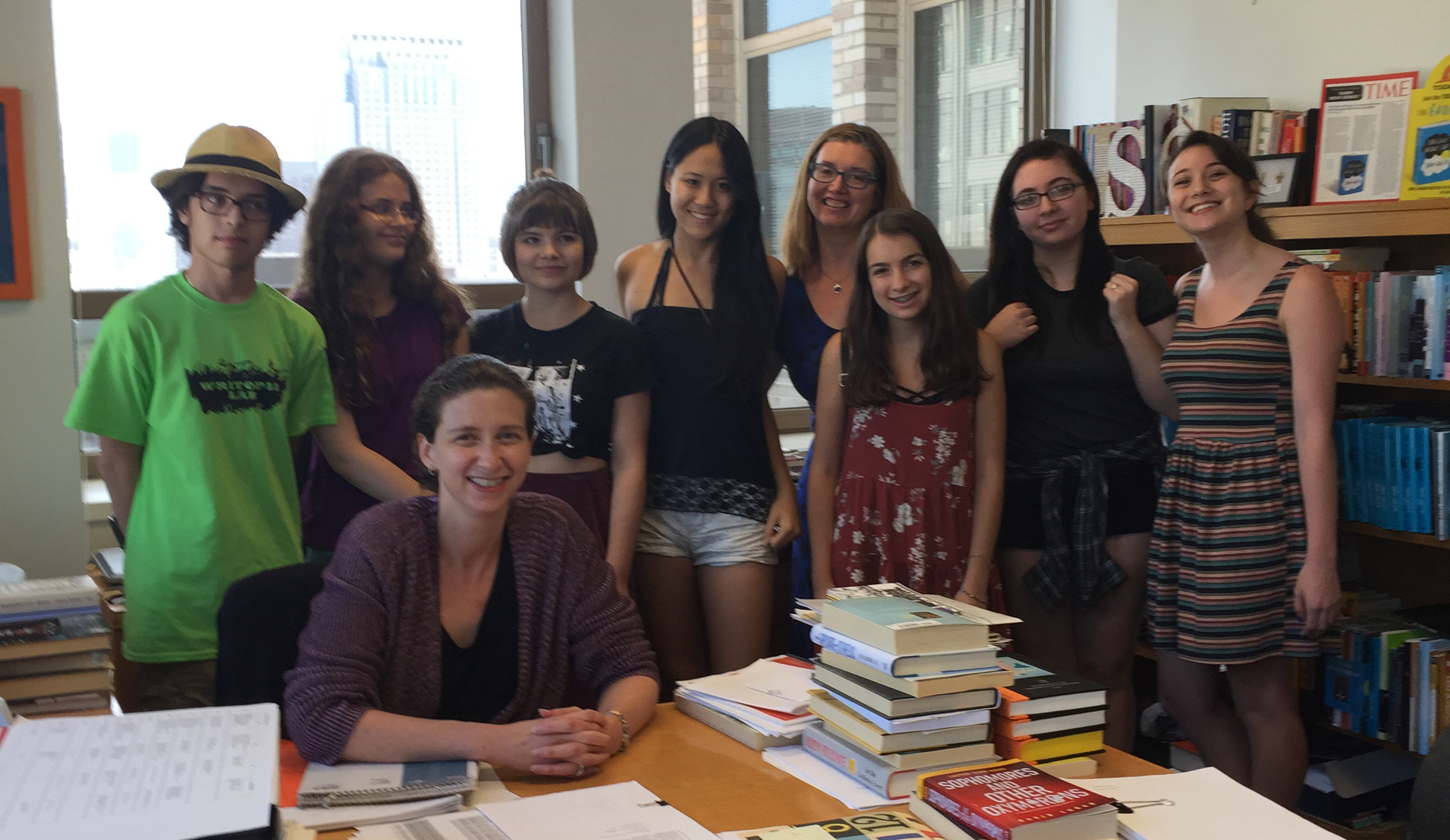 teens meeting with a professional working in publishing