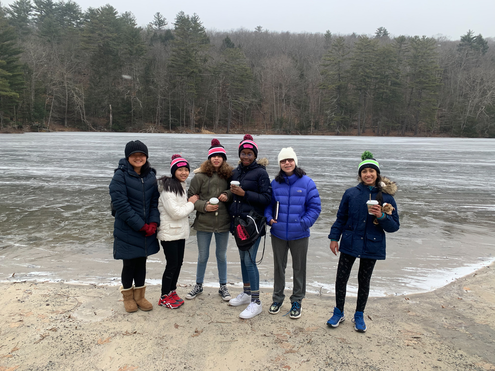 Campers in front of the lake